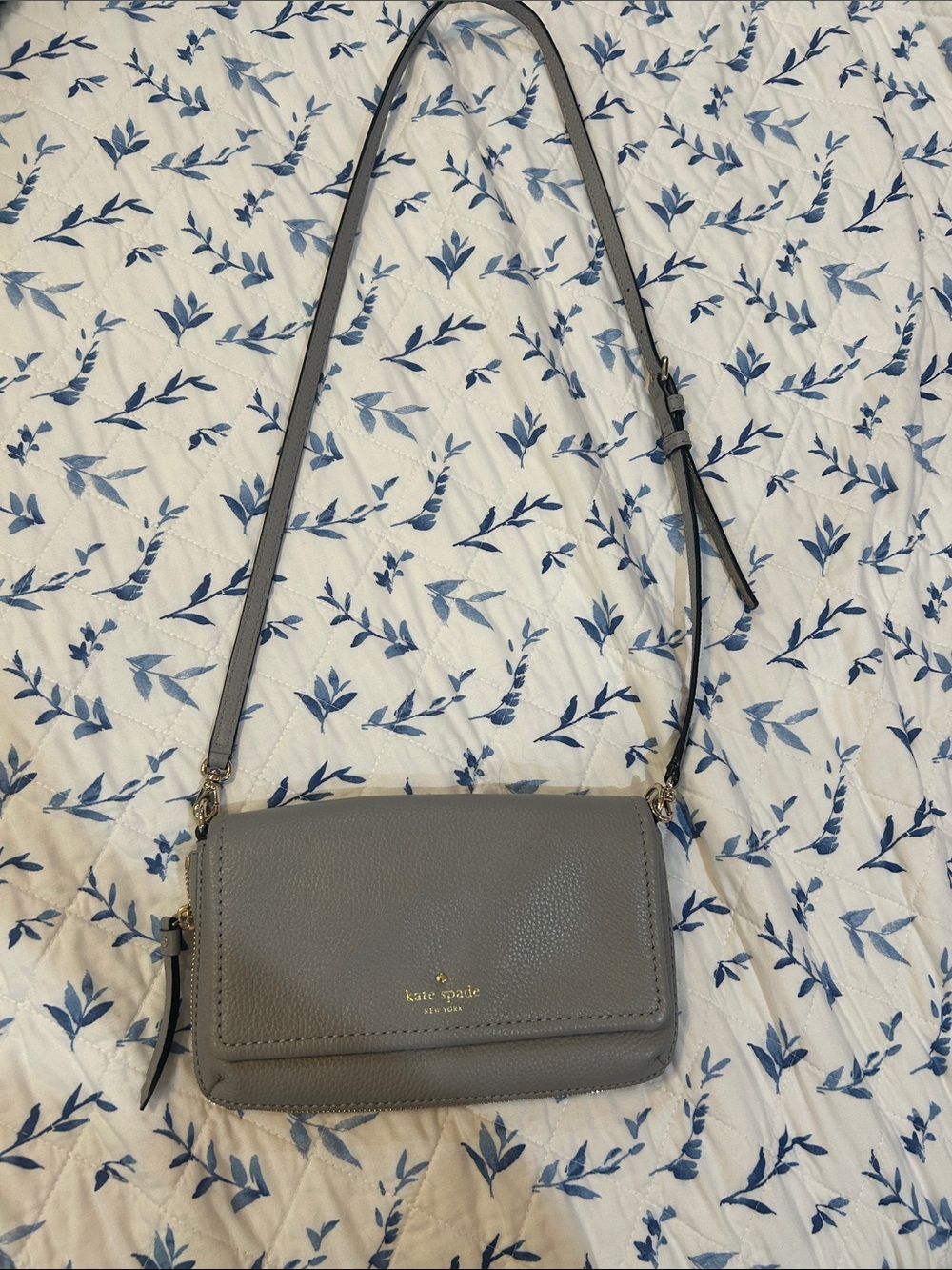kate spade gray pebbled leather crossbody with gold logo